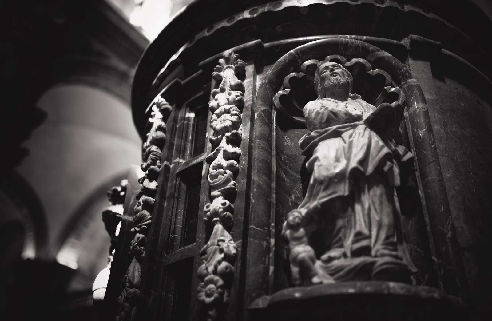 low angle of man in suit statue