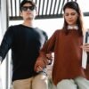 photo of woman assisting man