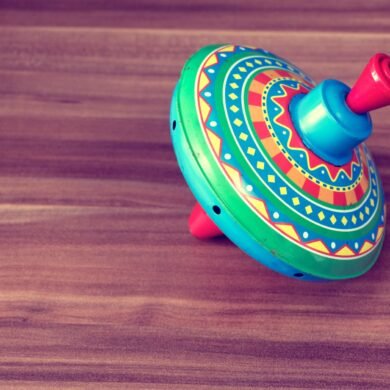blue and green spin toy
