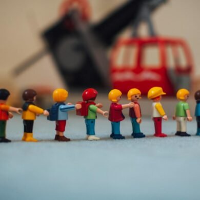 playmobil figures forming a line
